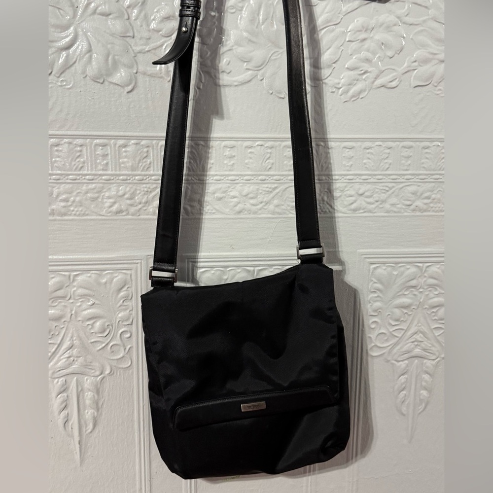 Tumi Crossbody  Nylon Leather Multi-pocket Adjustable Strap. Flaw see last pic